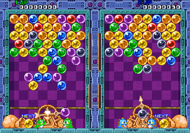 Het eerste Bubble Shooter spel: Puzzle Bobble, in multiplayer modus, gemaakt door Taito in 1994